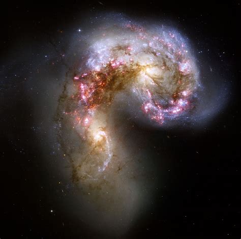 Colliding galaxies make love, not war | ESA/Hubble