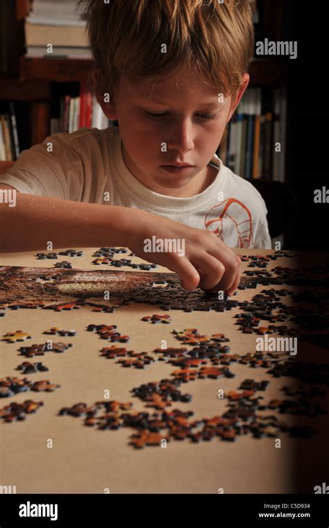 children boy Puzzle Game Stock Photo - Alamy