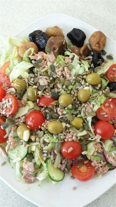 Subway salad bowl plus my own additions :) olives stuffed with garlic, cherry tomatoes, figs ...