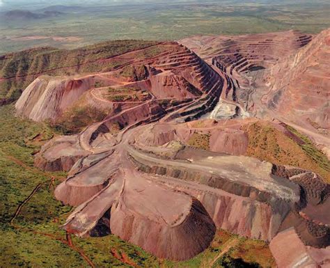 This aerial view of the Argyle diamond mine in northern Australia,... | Download Scientific Diagram