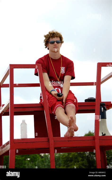 Male lifeguard on a beach at Alpena Michigan on Lake Huron Stock Photo ...