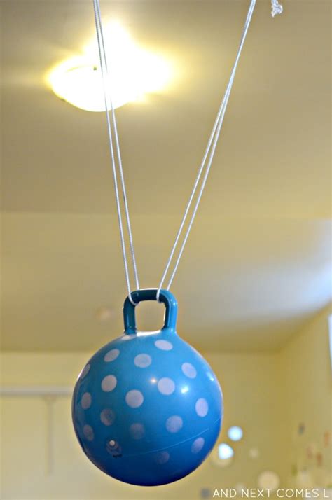 DIY Ball Swing {Sensory Hack for Kids} | And Next Comes L