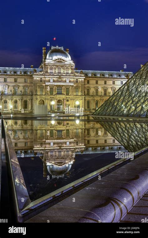 Louvre Museum at night in Paris, France Stock Photo - Alamy