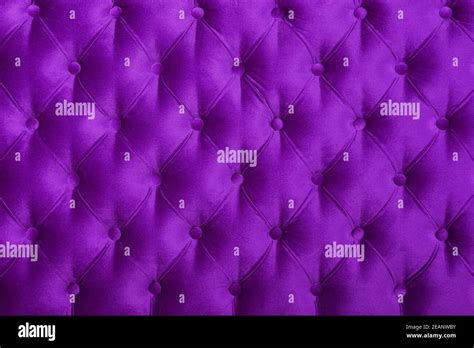 Violet capitone tufted fabric upholstery texture Stock Photo - Alamy