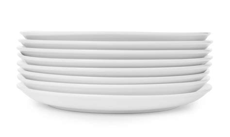 Premium Photo | Stack of clean plates on white background washing dishes