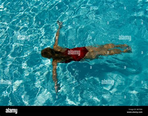 Child swimming underwater Stock Photo - Alamy