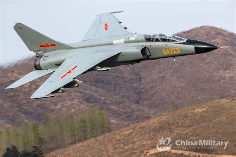 JH-7 fighter bombers soar through valley - China Military