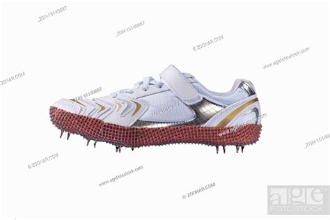 Sport shoes. White sneaker with spikes. Leather running shoes, Stock ...