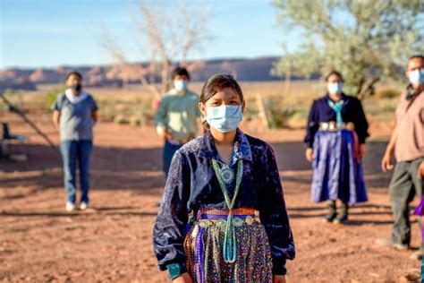 Navajo Family Spending Time Sharing Photos From A Smart Phone Stock ...