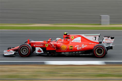 HD wallpaper: speeding formula-1 race car on race track during day, red Formula 1 car ...