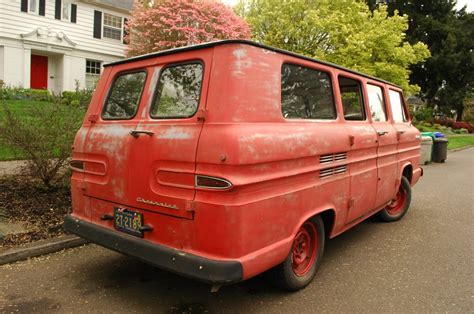 OLD PARKED CARS.: 1964 Chevrolet Corvair Greenbrier Sportswagon.