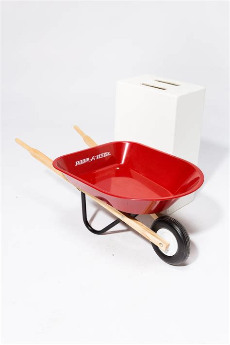 SP179 Child's Red Wheelbarrow Prop Rental | ACME Brooklyn