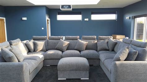 Cinema style sofa in grey. Fully modular, any shape, any size choose over 200 different fabrics ...