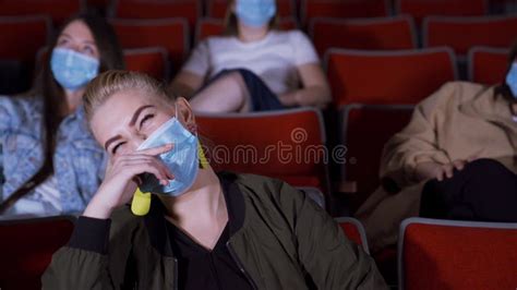 People in Masks Watch Funny Movie. Media Stock Image - Image of mask ...