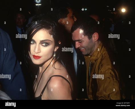 HOLLYWOOD, CA - MAY 6: (L-R) Singer Madonna and brother Christopher ...