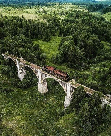 This abandoned railroad track with train still on it : r ...