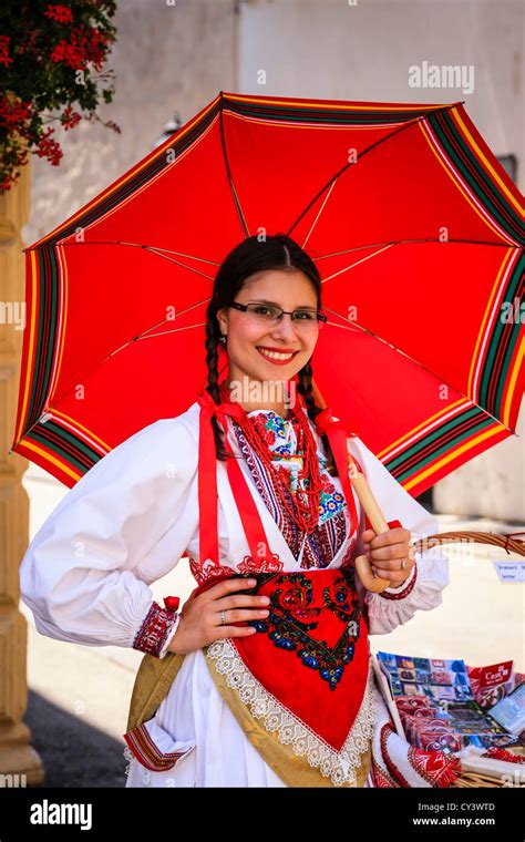 Croatian girl dressed in traditional clothing sells souvenirs in Zagreb Stock Photo - Alamy