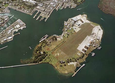 Ford Island is located in the middle of Pearl Harbor, Hawaii. It is ...