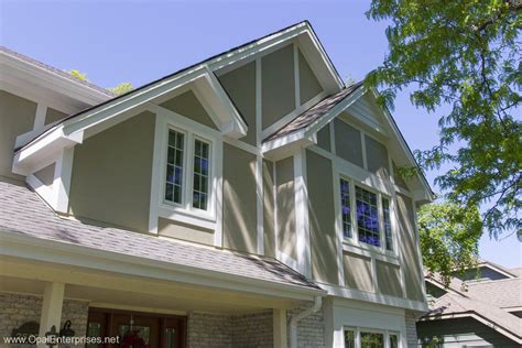 Stylish stucco and trim siding distinguishes this newly remodeled home | Opal Enterprises Inc