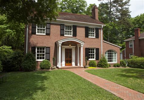 Red Brick Ranch House with Black Shutters: A Classic Home Design You ...