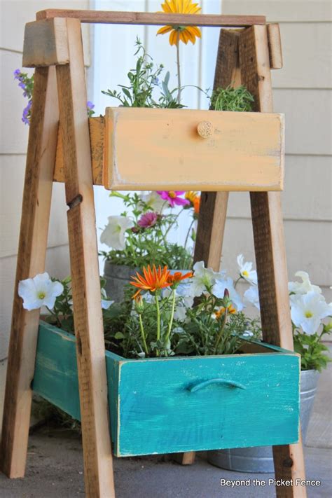 12 Ideas How To Create Unique Garden Art From Junk