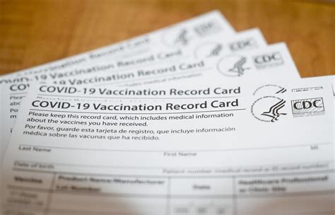 Should you laminate your CDC COVID-19 vaccine card? - The Points Guy