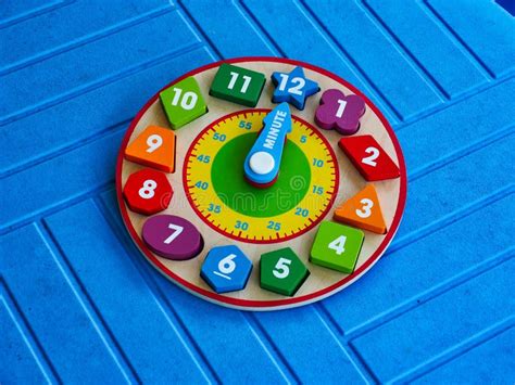 Colourful Kids Clock Puzzle Stock Image - Image of colourful, oclock: 232382705