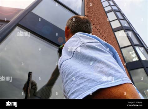 Professional glass cleaning Stock Photo - Alamy