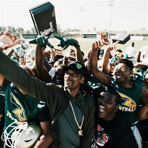 Snoop Dogg Surprises His Old High School Football Team with New Kicks ...