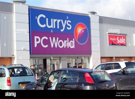 Currys and Pc World store selling electronics such as televisions ...