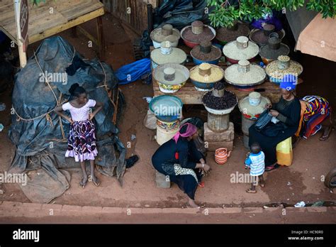 BURKINA FASO, Bobo Dioulasso, market, women sell food stuff like beans rice sorghum sesame maize ...