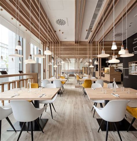 Pin de Zoltan Katona en search | Interiores de tiendas de café, Diseño de interiores del ...