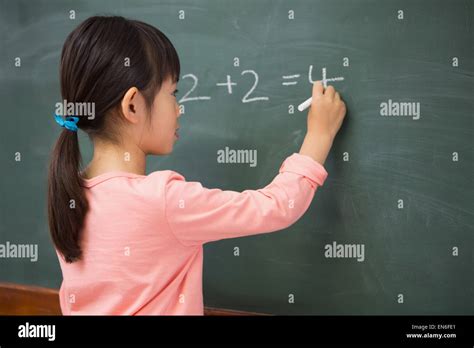 Child writing chinese numbers hi-res stock photography and images - Alamy