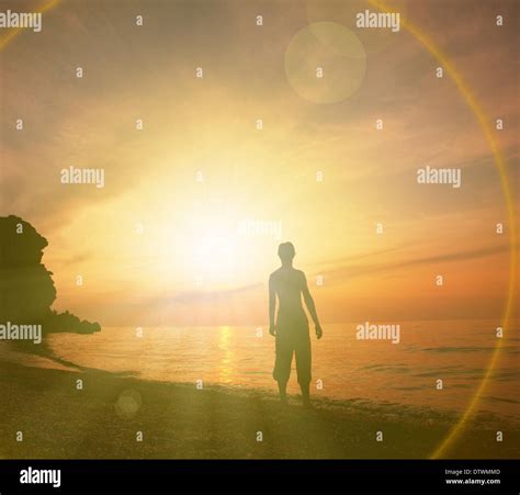 Beach scene on sunset Stock Photo - Alamy