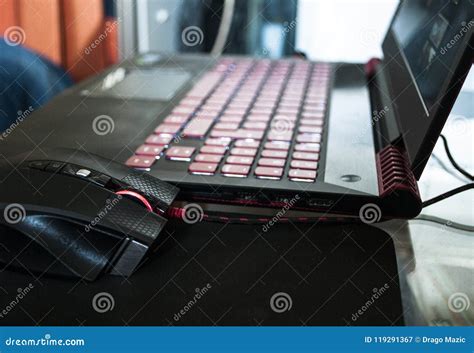 A red-black gaming laptop stock image. Image of design - 119291367