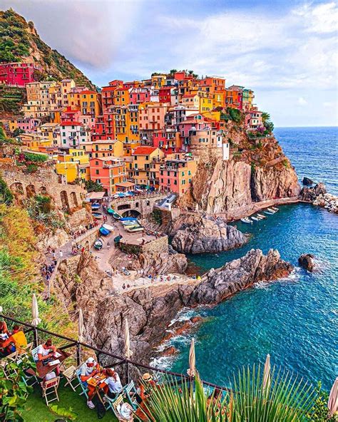 Manarola in Cinque Terre the village on the rocks |by @takemyhearteverywhere| Double tap if you ...