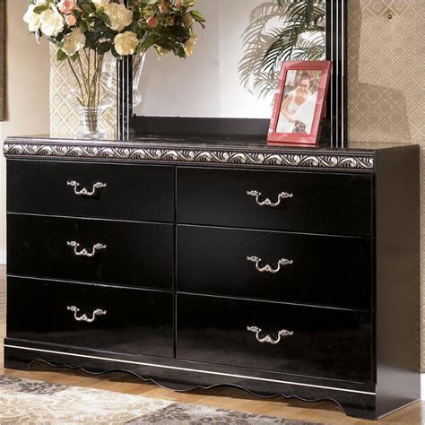 B104-31 Ashley Furniture Constellations - Black Dresser