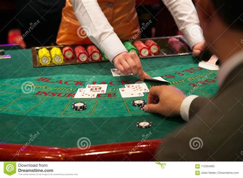 Dealer Puts Down a Card on Blackjack Table Stock Image - Image of jack ...