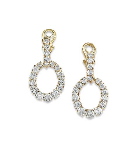 A PAIR OF DIAMOND EARRINGS | Christie's