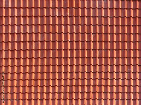 Roofing texture. Red corrugated tile element of roof. Seamless pattern. close up of red roof ...