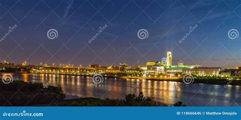 Night Scene of Omaha Waterfront with Light Reflections on the R Omaha Nebraska Skyline with ...