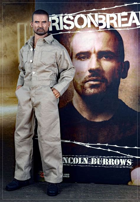a man in overalls standing next to a poster with prison break written on it