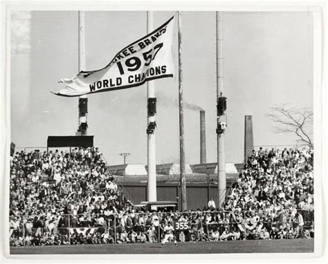 Hoisting of Milwaukee Braves 1957 World Champions pennant at Milwaukee County Stadium ...