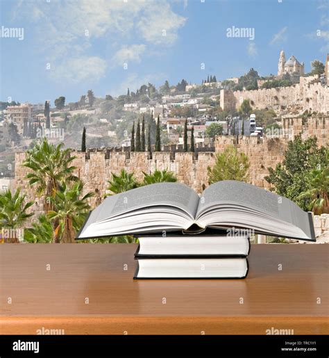 Books on desk Stock Photo - Alamy