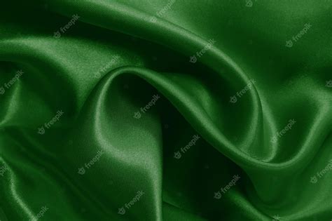 Premium Photo | Green emerald fabric texture background crumpled ...