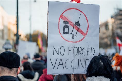 Protester at protest against vax mandate protest holding s… | Flickr