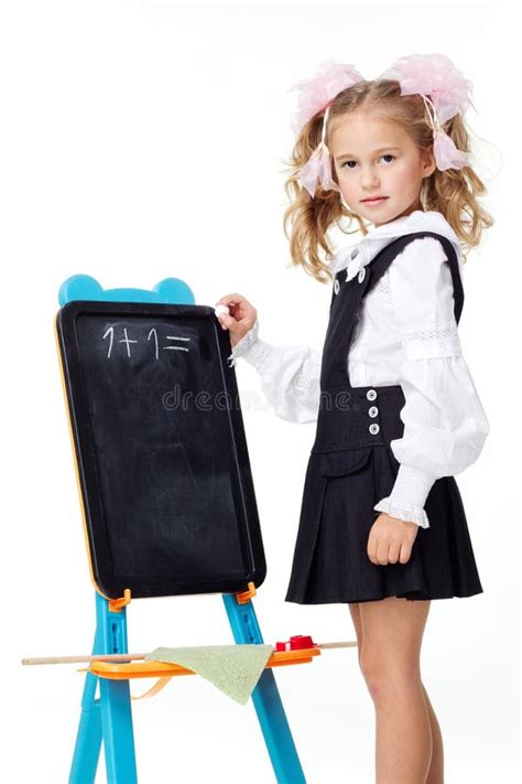 Portrait of a First Grader in a School Uniform on a White Background ...