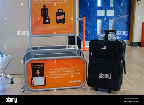 Suitcase beside an Easyjet bag size gauge Stock Photo: 62050183 - Alamy