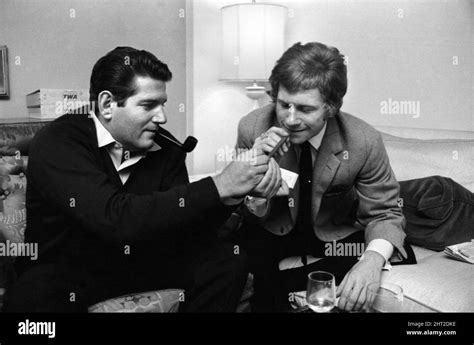 Allen Klein (left) and Andrew Loog Oldham meeting in London's Hilton Hotel discussing Klein's ...