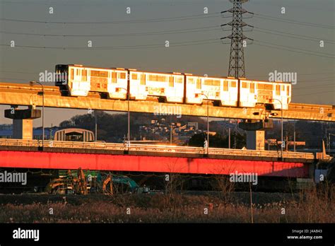 Tama Monorail traveling over Tappi Bashi Bridge on Tama River Tachikawa ...